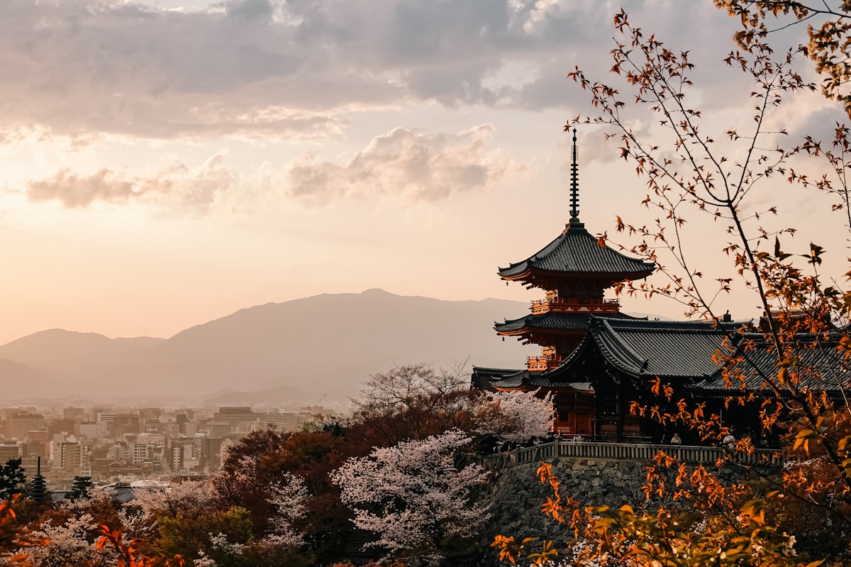 Kiyomizu-dera temple in Kyoto with cherry blossoms at sunset