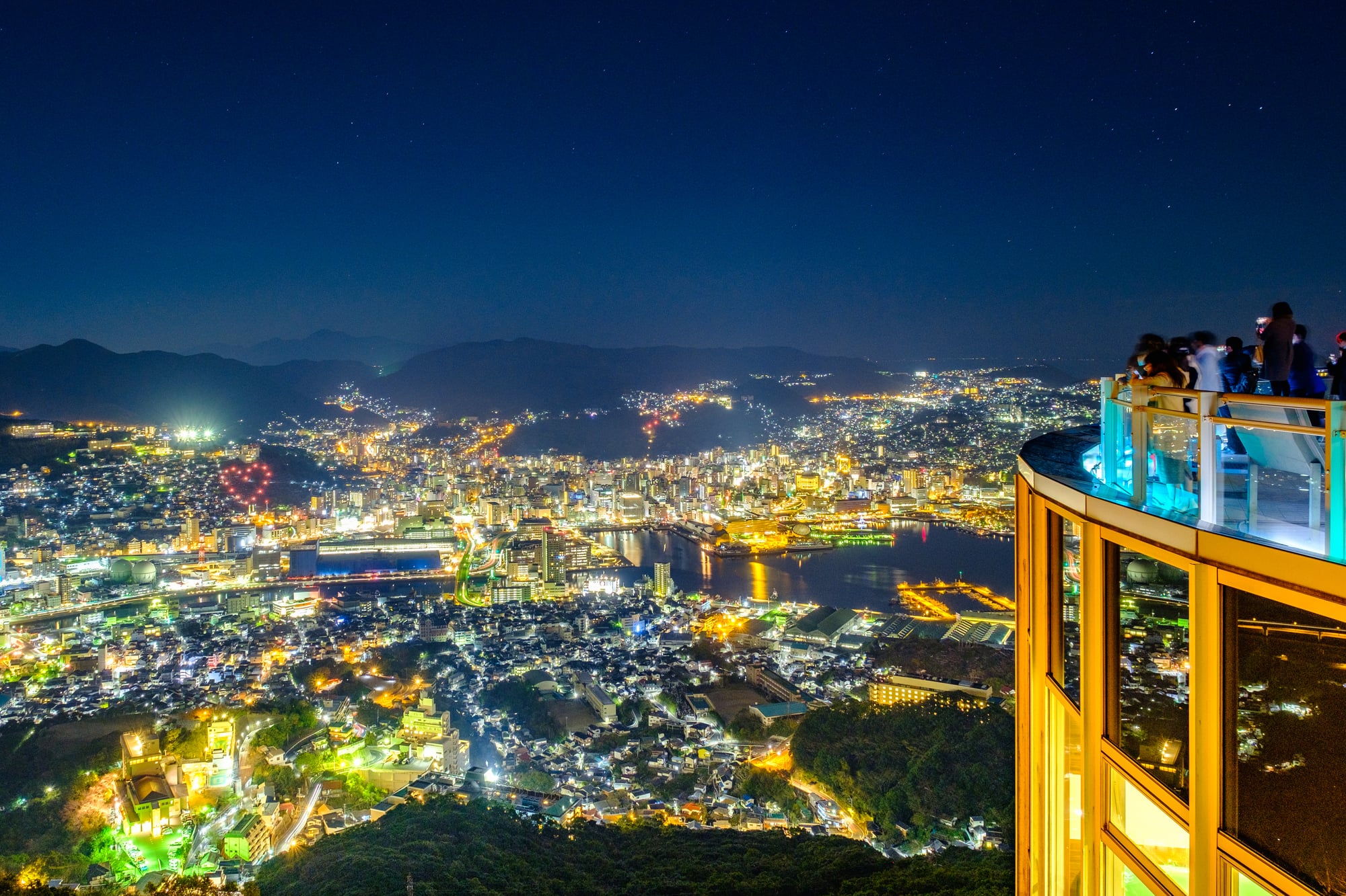 Nagasaki harbor and illuminated city seen from the Mount Inasa observation area at night